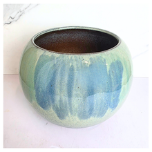 Load image into Gallery viewer, Ares Two green ceramic pots on a white marble surface with 'LEAFAERIE' branding.