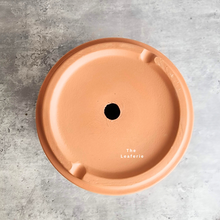 Load image into Gallery viewer, The Leaferie terracotta E Pot with holes. comes in 2 sizes