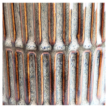 Load image into Gallery viewer, Elira Ceramic pot with ribbed texture on a white background, featuring the Leaferie brand.