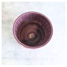 Load image into Gallery viewer, Zafira Brown ceramic planter with wavy pattern on a gray surface, branded 'LEAFERIE'.