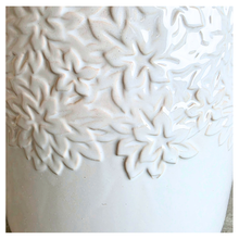 Load image into Gallery viewer, Mason White ceramic planter with floral patterns on a marble surface, featuring the Leaferie brand.