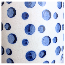 Load image into Gallery viewer, Cirra White ceramic planter with blue dot pattern on a light gray background, featuring the brand 'LEAFAERIE'.