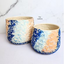 Load image into Gallery viewer, The Leaferie Huda flowerpot. colourful rainbow ceramic pot