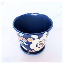 Load image into Gallery viewer, Jasna Decorative ceramic planter with floral design on a white background, featuring the brand 'LEAFERIE'.