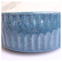 Load image into Gallery viewer, Bloom Blue ceramic bowl with textured surface on a white background, featuring the LEAFAERIE brand.