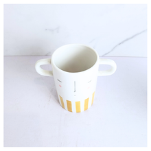 Load image into Gallery viewer, Dorei Two pots with polka dot and striped design on a marble background, featuring the LEAFERIE brand.