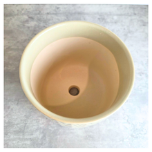 Load image into Gallery viewer, Vesper Beige ceramic pot with geometric pattern on a marble surface, featuring the LEAFAERIE brand.