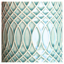 Load image into Gallery viewer, Caleb Teal patterned ceramic planter on a gray surface with 'LEAFERIE'