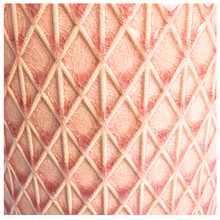 Load image into Gallery viewer, Petalia Decorative pink pot with geometric pattern on a marble background, featuring the brand