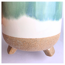 Load image into Gallery viewer, Lumea Ceramic planter with green and beige gradient on a marble background, featuring the brand 'LEAFERIE'.