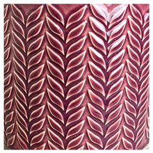 Load image into Gallery viewer, Zoya Pink ceramic pot with leaf pattern on a gray surface, branded 'LEAFERIE'.