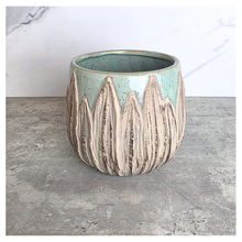 Load image into Gallery viewer, Rowan ceramic planters with textured design on a gray surface, branded 'LEAFERIE'.