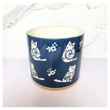 Load image into Gallery viewer, Niko cat Navy blue mug with white cat designs on a white background, featuring the brand 'LEAFERIE'.