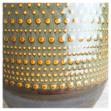 Load image into Gallery viewer, Lowell pot with gold and black design on a gray surface, featuring the Leaferie brand.