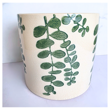 Load image into Gallery viewer, Verdin Two ceramic planters with green leaf patterns on a light blue background, featuring the brand 'LEAFERIE'.