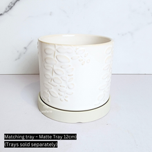 Load image into Gallery viewer, The Leaferie reidun white ceramic pot with flower motif.