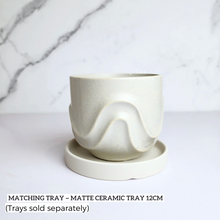 Load image into Gallery viewer, The Leaferie Tymo white pot. wavy design and ceramic material