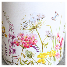 Load image into Gallery viewer, The Leaferie Rhea Two ceramic planters with floral designs on a marble surface, featuring the brand 'LEAFERIE'.