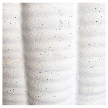 Load image into Gallery viewer, Ripple White ceramic planter with wavy texture on a marble background, featuring the Leaferie brand.