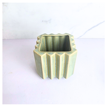 Load image into Gallery viewer, Rosin square ceramic planters with striped design on a marble surface, featuring the brand 'LEAFERIE'.