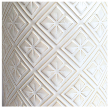 Load image into Gallery viewer, Elaris White textured ceramic planter on a marble background with 'LEAFAERIE' branding.