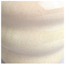 Load image into Gallery viewer, A ceramic planter pot with a wavy, ribbed design in a speckled cream-beige glaze, set against a white marble-patterned background. The brand name 'LEAPERIE' is visible at the top, and the product name 'Petelle' is shown at the bottom left.