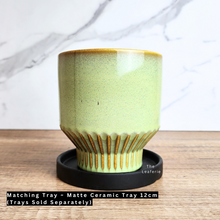 Load image into Gallery viewer, The Leaferie Bairn green flowerpot. ceramic material