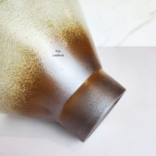 Load image into Gallery viewer, base of planter with 'The Leaferie' branding on a white background