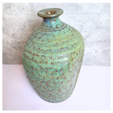 Load image into Gallery viewer, Lumo Ceramic vase with textured surface and 'LEAFERIE' branding on a light gray background