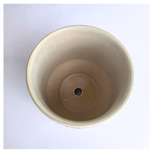 Load image into Gallery viewer, Tetra Ceramic cup with multicolored stripes on a light background, featuring the brand 'LEAFAERIE'.