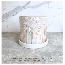 Load image into Gallery viewer, Meliora Ceramic planter with floral patterns on a gray surface, branded 'Meliora' and 'Leaferie'.