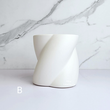 Load image into Gallery viewer, The Leaferie Synnove ceramic planter. 2 colours. front view of B