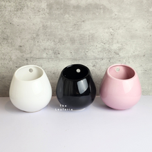 Load image into Gallery viewer, The Leaferie Aya Wall Hanging Pot. 3 colours. white, pink and black ceramic pots.
