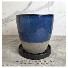 Load image into Gallery viewer, Ryder Blue and beige ceramic planter with 'Leaferie' branding on a marble background