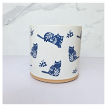 Load image into Gallery viewer, Niko cat Navy blue mug with white cat designs on a white background, featuring the brand 'LEAFERIE'.