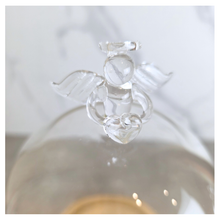 Load image into Gallery viewer, Angel Glass terrarium with a small plant on a wooden base, featuring the Leaferie brand.