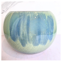Load image into Gallery viewer, Ares Two green ceramic pots on a white marble surface with 'LEAFAERIE' branding.