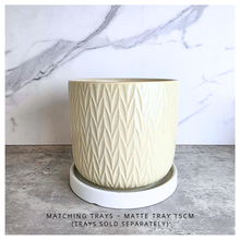 Load image into Gallery viewer, Vesper Beige ceramic pot with geometric pattern on a marble surface, featuring the LEAFAERIE brand.