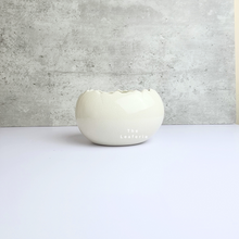 Load image into Gallery viewer, The Leaferie Maja Egg flowerpot. cream white ceramic pot. front view of designs B