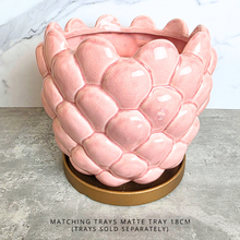 Load image into Gallery viewer, A pink ceramic planter with a textured, scaled leaf-like pattern, labeled 'Runa' by the brand LEAFERIE, set against a white marble background.