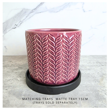 Load image into Gallery viewer, Zoya Pink ceramic pot with leaf pattern on a gray surface, branded 'LEAFERIE'.