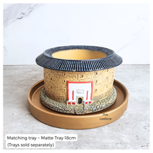 Load image into Gallery viewer, Decorative pot with a matching tray on a light surface, branded 'The Leaferie'.