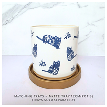 Load image into Gallery viewer, Niko cat Navy blue mug with white cat designs on a white background, featuring the brand 'LEAFERIE'.