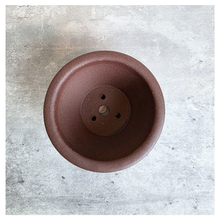 Load image into Gallery viewer, Petit bonsai 28. Collage of terracotta bonsai pots with 'LEAFERIE' branding on a light background.