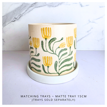 Load image into Gallery viewer, Tierra Decorative pot with floral design on a marble background, featuring the brand 'LEAFERIE'.