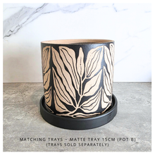 Load image into Gallery viewer, Verdelle Two ceramic pots with leaf pattern on a gray surface, branded 'LEAFTERIE'.