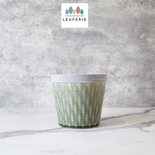 Load image into Gallery viewer, The Leaferie Emilia Plant pot . green ceramic . front view