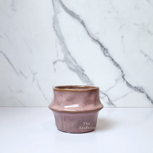 Load image into Gallery viewer, The Leaferie Harsha pink pot 2 sizes made of ceramic. front view of mini size