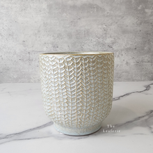 Load image into Gallery viewer, The Leaferie Lei plant pot. cream ceramic. front view. close up