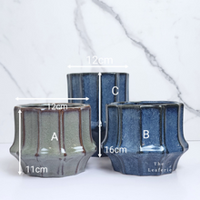 Load image into Gallery viewer, The Leaferie Lilo planter. blue and green colour. ceramic material . 3 designs. Front view and size